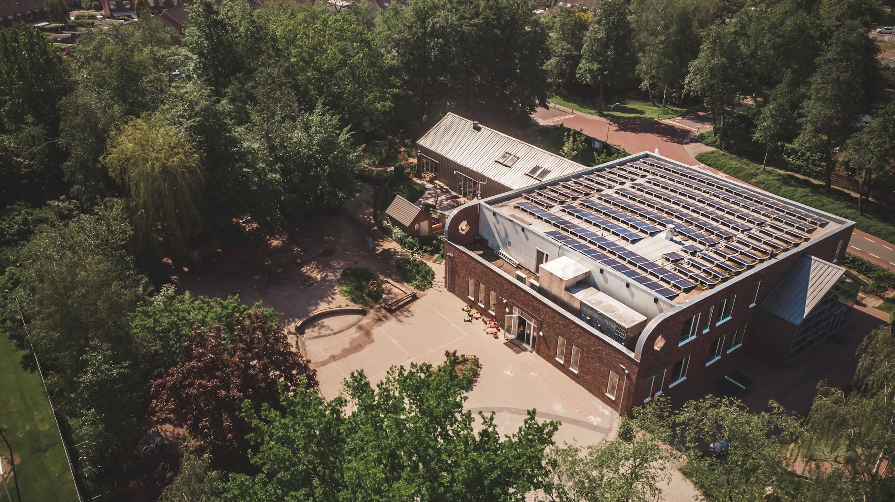 Aerial view of a solar panel roof being analyzed